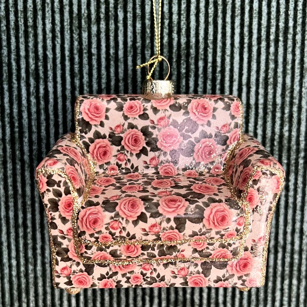 Til retro-fans: en lille sofa i glas, pyntet med blomster.
