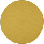 Flot lille rundt tæppe i gul afdæmpet farve - diameter 90 cm