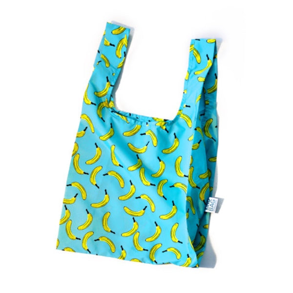 Taske i friske farver med banan motiv på.
