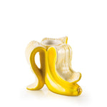 Små lysesteger som giver et eksotisk pift - meget sjove lysestager i kraftig gul farve. Præcis ligesom en rigtig banan. Skab en masse banana romance med disse unikke bananstager.